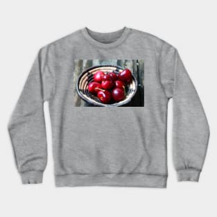 Red cherries in a basket. Crewneck Sweatshirt